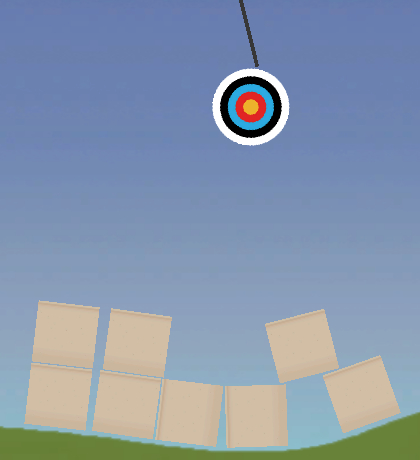 Screenshot showing a target hanging from a cord in the air. Underneath are several boxes placed on grass.